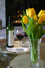 Enjoy a glass of wine by the fire at the High Pointe Inn Bed and Breakfast on Cape Cod